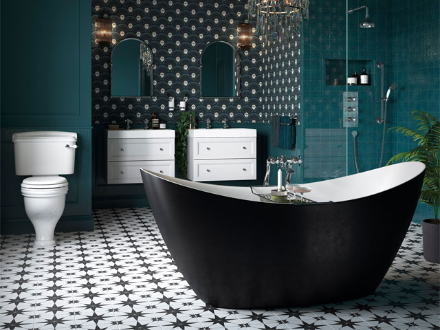 black bathtub in a dark, dramatic bathroom with teal walls and monochrome floor tiles