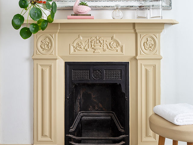 renovated period fireplace in an Edwardian bathroom makeover