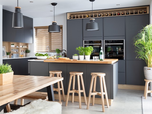 nature-inspired kitchen design featuring natural materials and plants