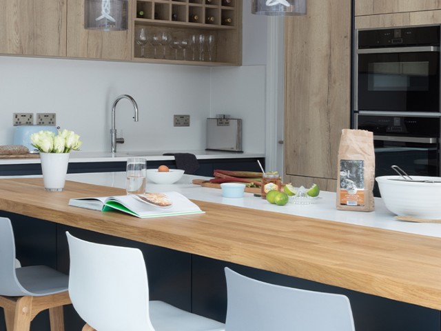 nature-inspired kitchen design: kitchen island with natural wooden worktop
