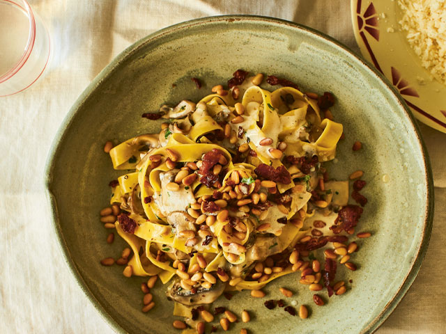Tagliatelle with mushrooms, pine nuts and pancetta from The Italia Pantry by Theo Randall. Photo: Lizzie Mayson