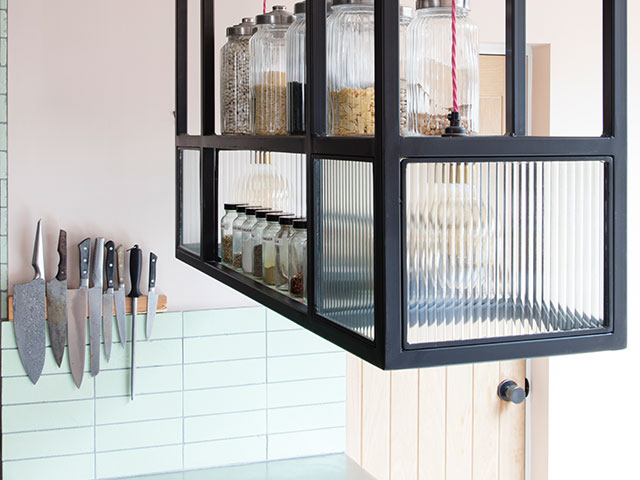 A restaurant style cupboard has been ceiling mounted to cater for glassware