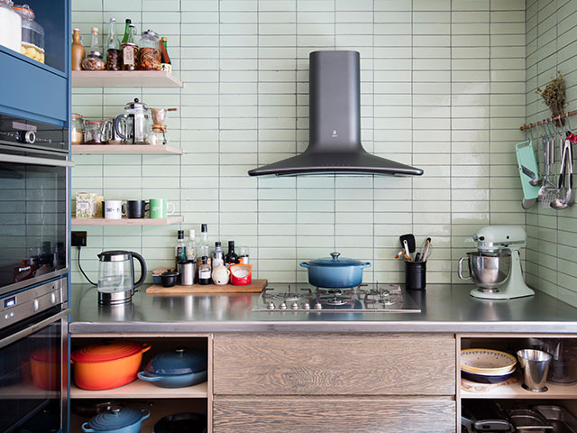 Open plan shelves help with easy access in an industrial kitchen