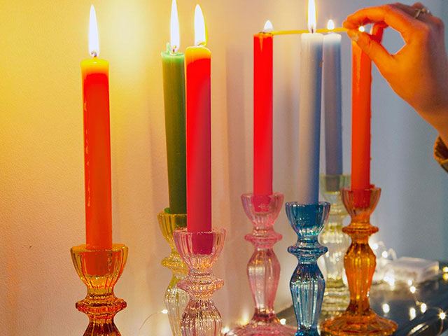Line the mantlepiece with candlesticks to add atmosphere to the room