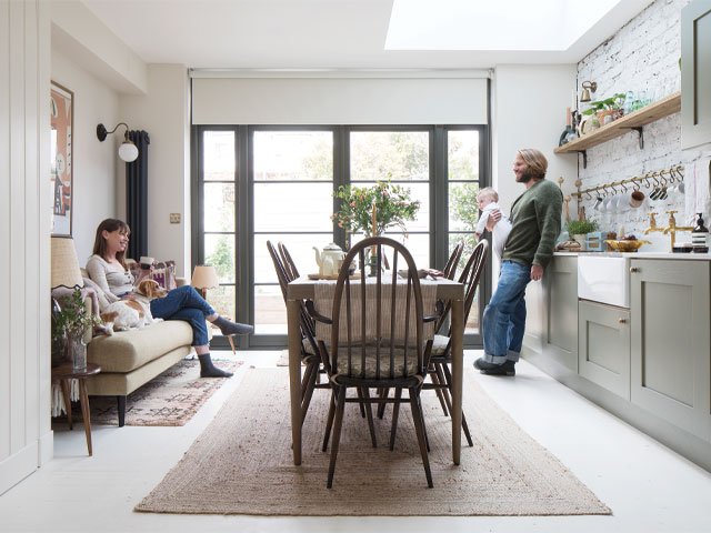 Kitchen-diner extension with industrial doors and skylight in east London 