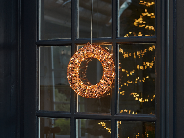 A light up wreath will make a lovely addition to your Christmas doorscape