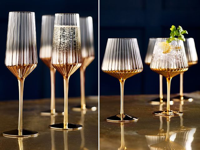 Art Deco style glasses and champagne flutes with gold-painted stems from Next