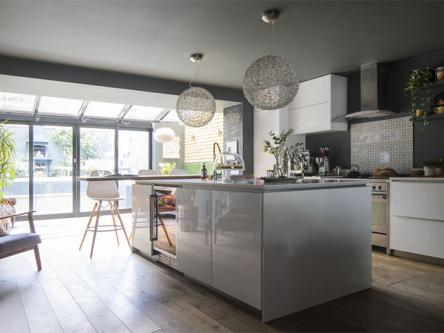 modern kitchen extension with island in a ground-floor london apartment