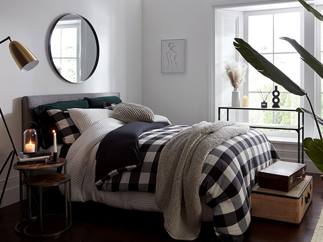 Try a layering your duvets to add some cosiness to your bedroom