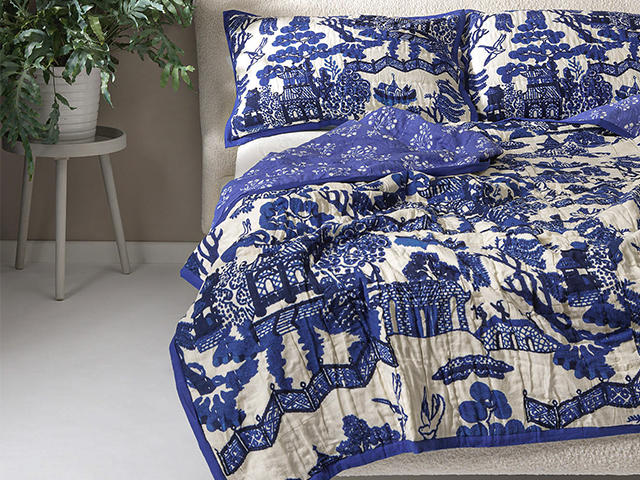 A bright blue and bold bedding print will add a statement to your bedroom