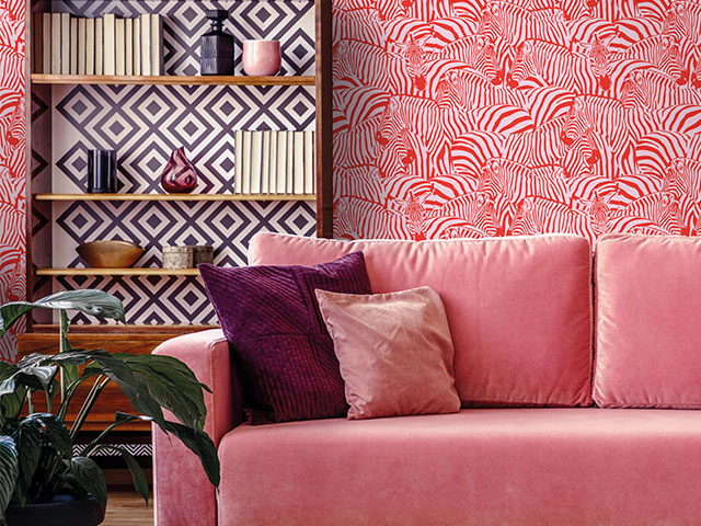 Line the back of your bookshelves with wallpaper