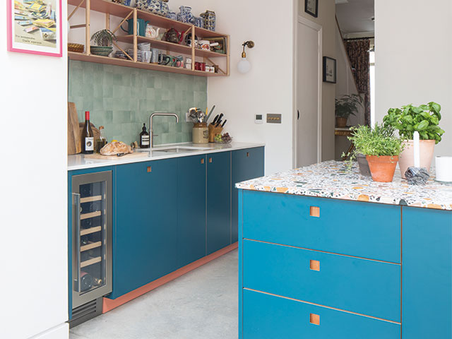 Two tones of blue cabinetry work in this kitchen