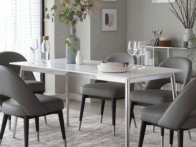 White marble ceramic dining table in grey themed dining room