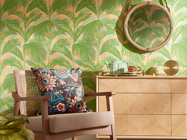 Summer green wallpaper with trees in 70s inspired living room