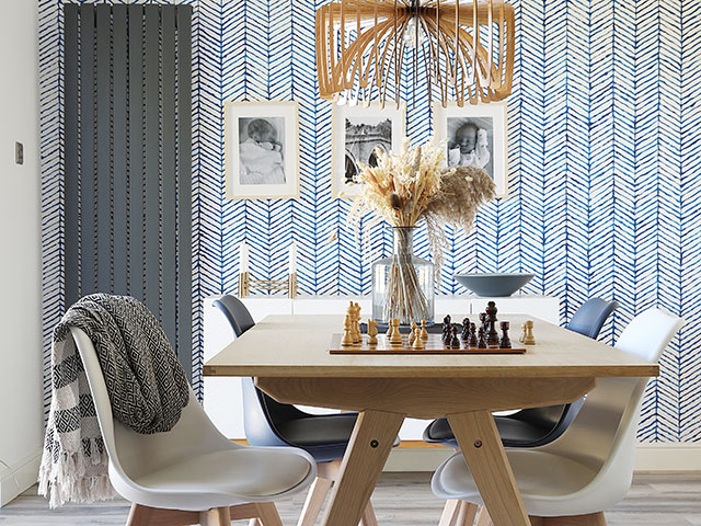 Dining area with pampers grass on table and chess set