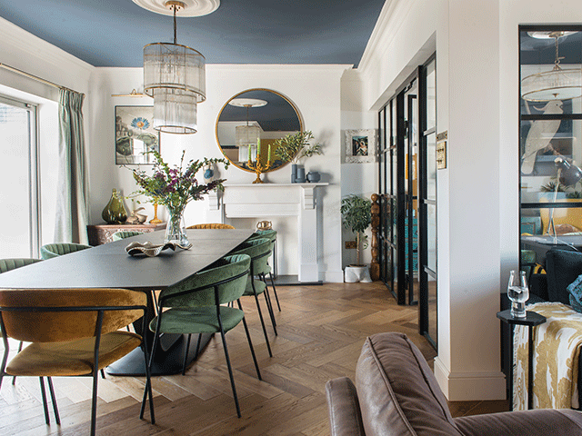 Dining room with a navy blue ceiling