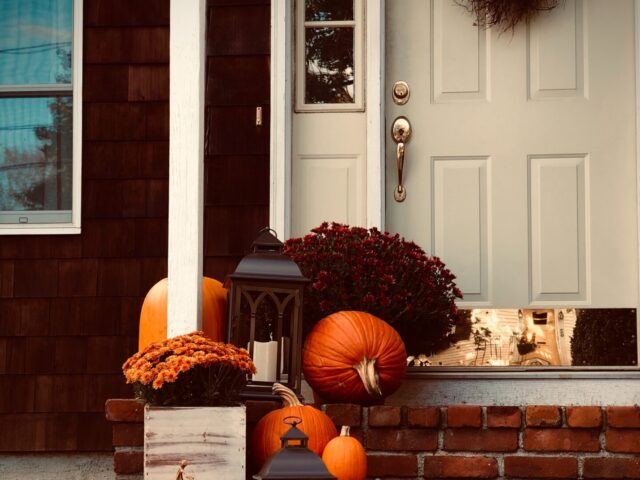 Pumpkins on front door steps