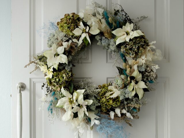 Christmas wreath with poinsettias and hydrangeas