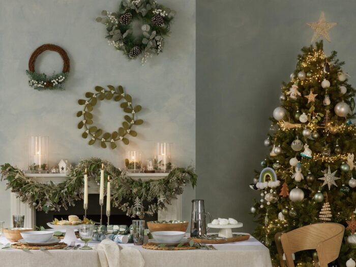 Christmas dining table with tree and three wreaths
