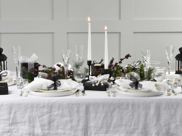 A crisp white tablecloth can elevate your festive tablescape