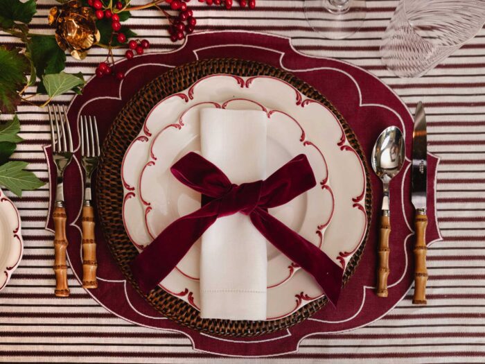 Layered crockery and placemats can make a statement look on your table