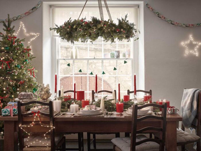 A hanging chandelier wreath makes a wonderful statement to your Christmas table