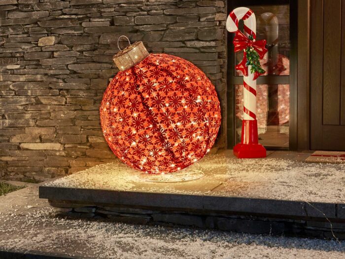 Go for colour and fun with oversized Christmas baubles and candy canes