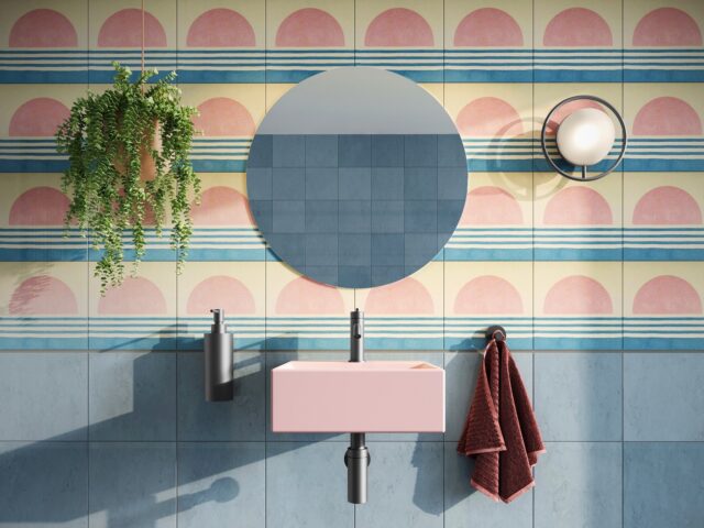 Pink cloakroom basin with pastel wall tiles