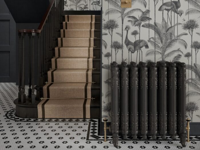 Hallways with botanical wallpaper and black painted staircase