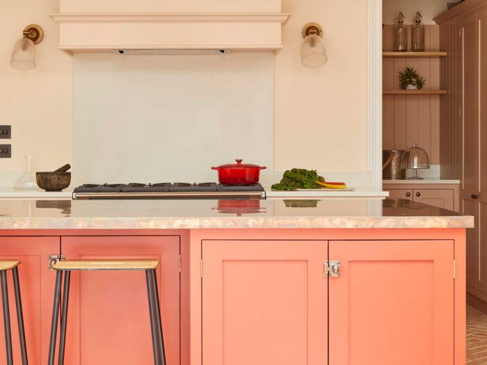 Try a bold peach for your cabinetry for a fun, vibrant feel in the kitchen