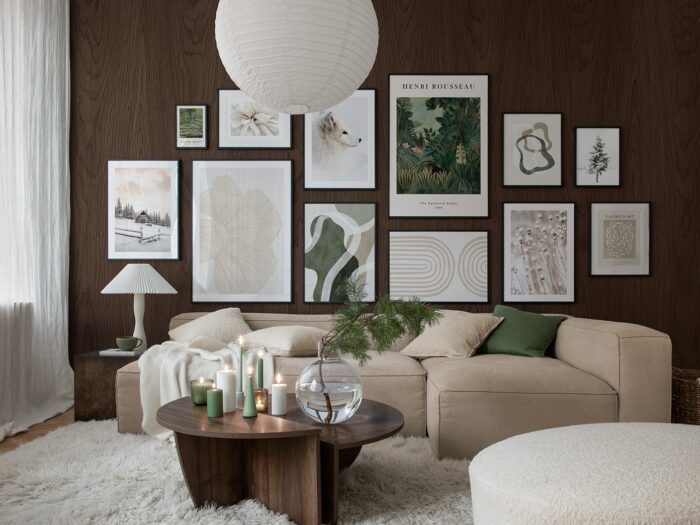 Gallery wall in green living room above cream sofa