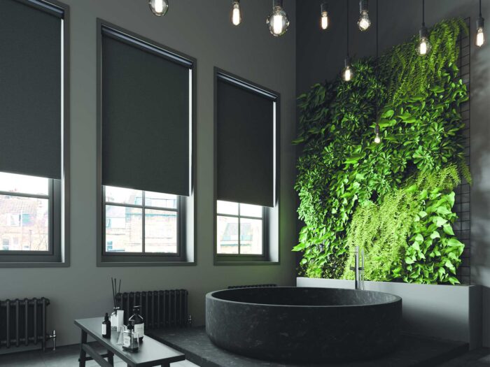 Try a chic, black bath tub for a dramatic look