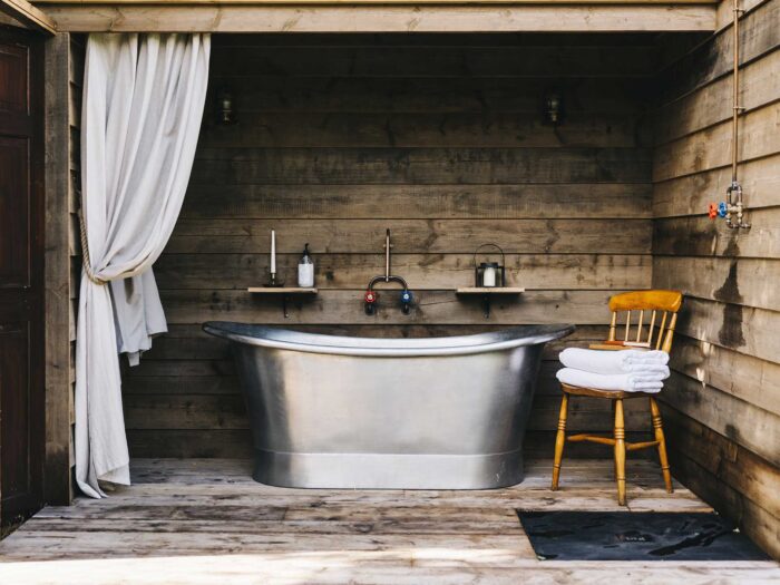 An outdoor tub will be a showstopper in your garden space