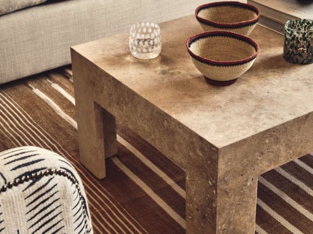 Travertine table by OKA