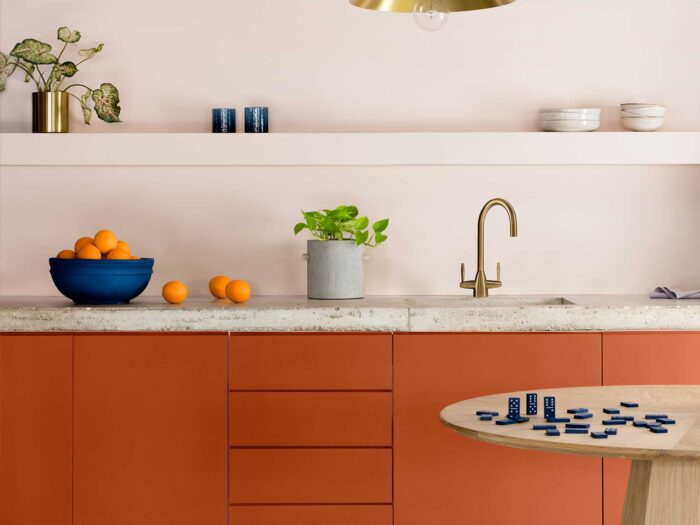Before ripping out your kitchen, consider repainting your cabinetry