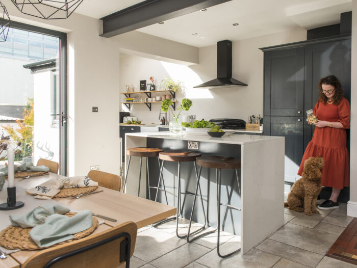 ciara murphy in kitchen with dog