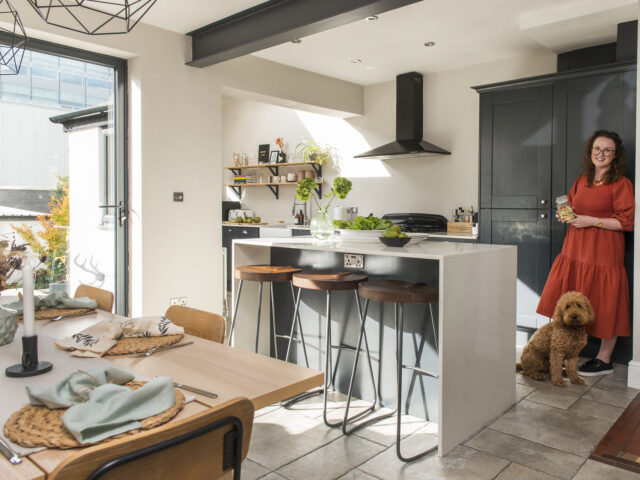 ciara murphy with dog in kitchen