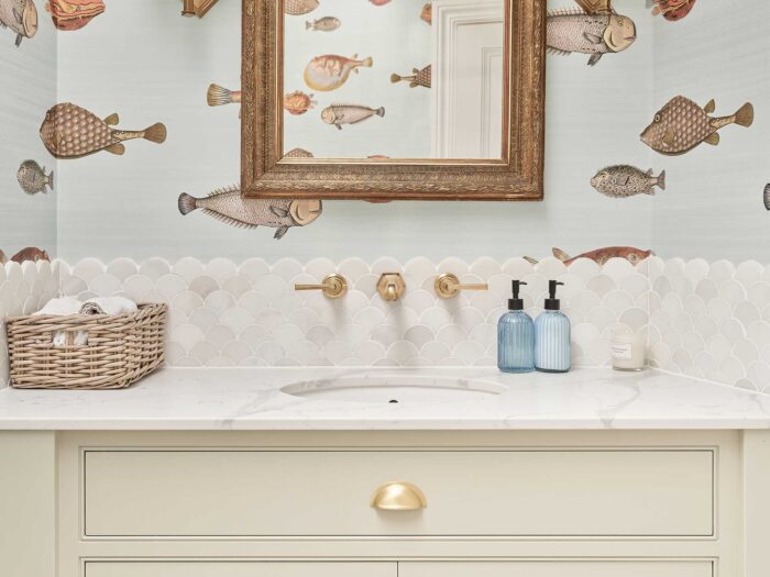 Using scalloped marble is a way of bringing shape into your bathroom