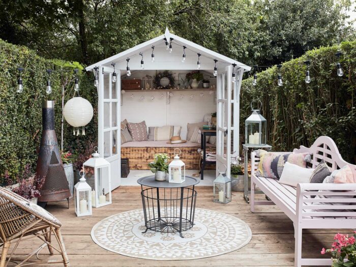 A boho garden room can be made out of a wooden garden shed