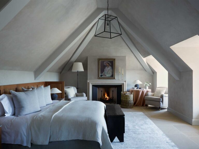 The beautiful high-vaulted ceilings of the bedroom in the Long Room at Heckfield Place