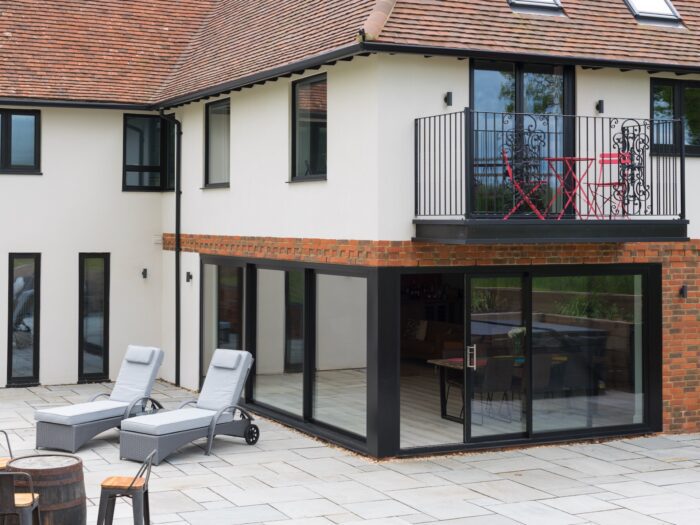 Corner extension with sliding doors