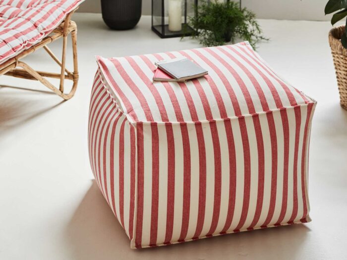 A striped pouffe is a summer accessory that will bring a smile to your face