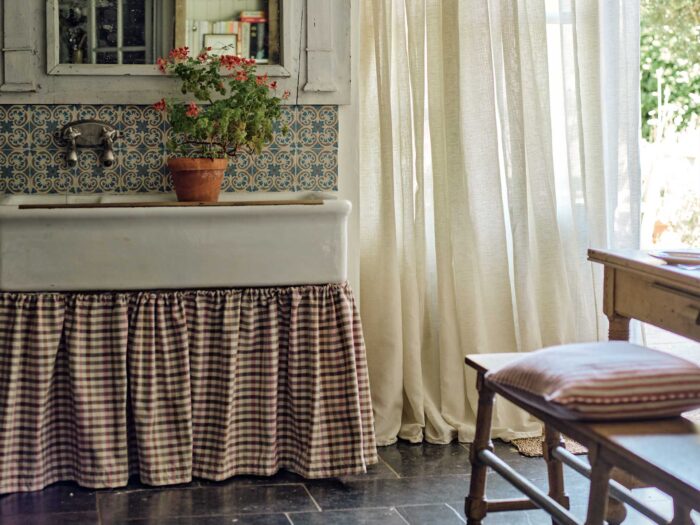Gingham is the perfect fabric to create a sink skirt