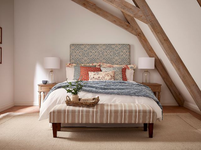 Bedroom with patterned bedlinen by ILIV