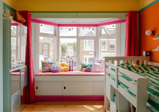 Window seat utilising space in disco themed children's bedroom.