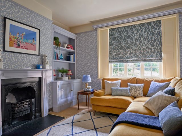 Calming living room space with roman blinds from Hillarys