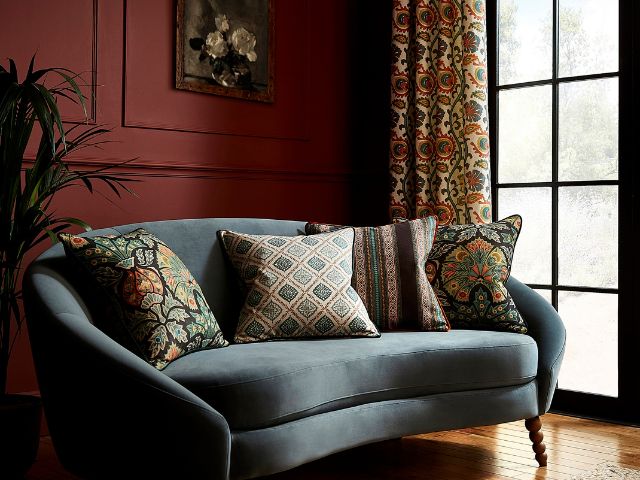 Blue sofa with red background