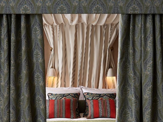 Bedroom with curtains and swags