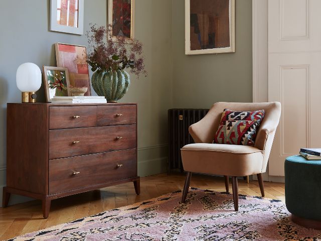 Well styled living room with artwork and a sideboard by Swoon