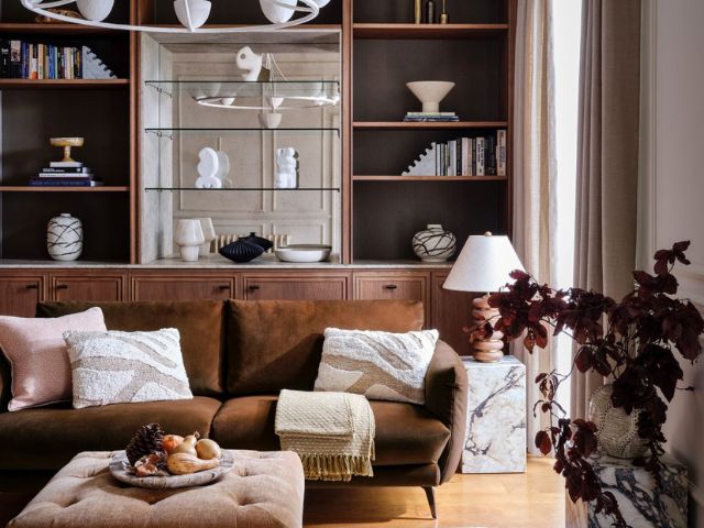Leather sofa with built in cupboards in a living room